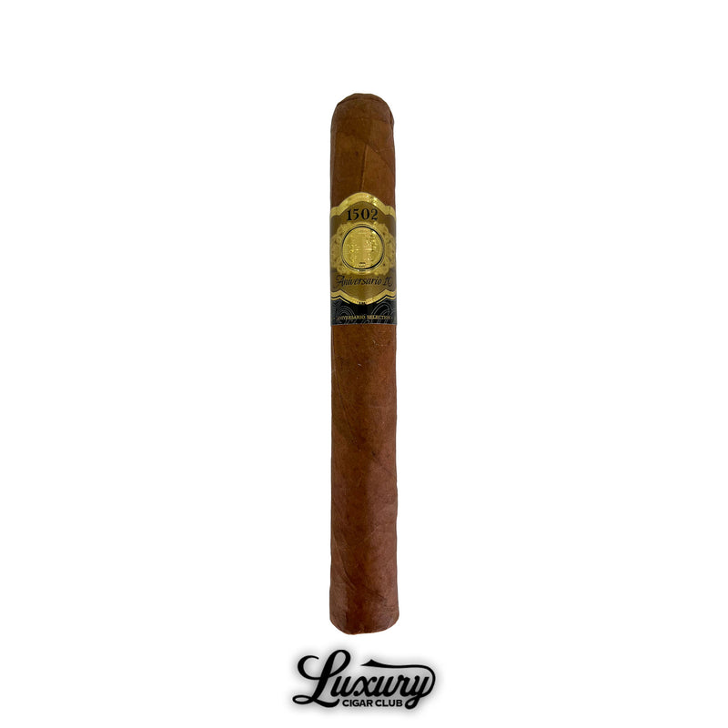 Single 1502 Aniversario 10 Toro cigar with gold and black label, displayed by Luxury Cigar Club.