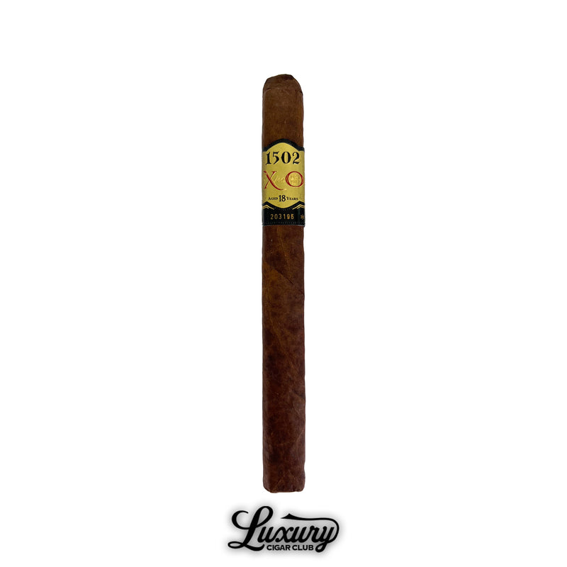 Single 1502 XO Churchill cigar with gold and black band labeled aged 18 years from Luxury Cigar Club