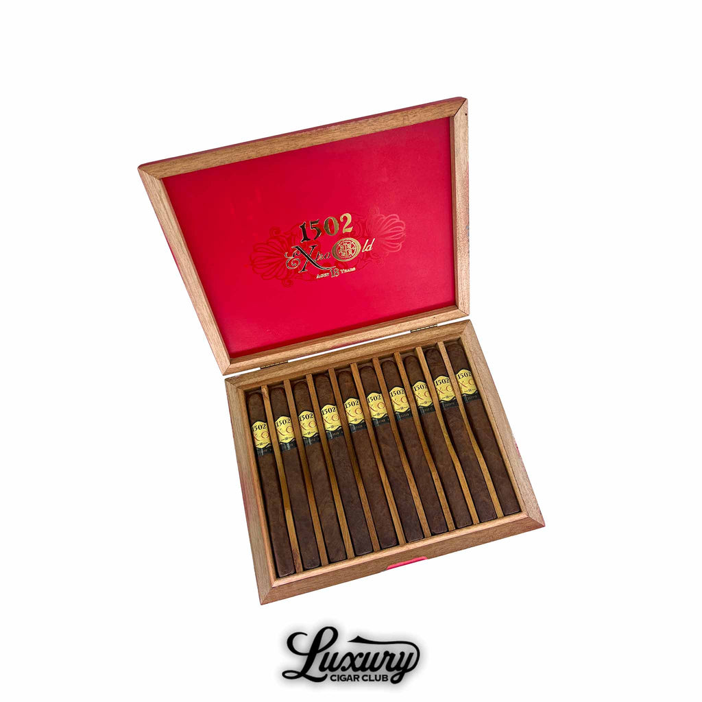 Open box of 1502 XO Churchill cigars aged 18 years with gold and black cigar bands displayed by Luxury Cigar Club