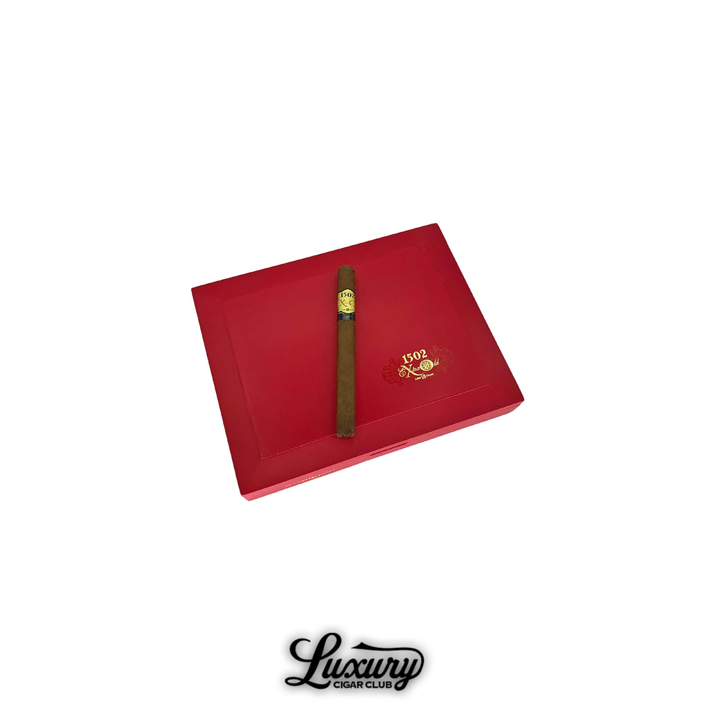 Closed 1502 XO cigar box in red with gold logo and a single 1502 XO cigar resting on top, highlighting premium aged cigars at Luxury Cigar Club.