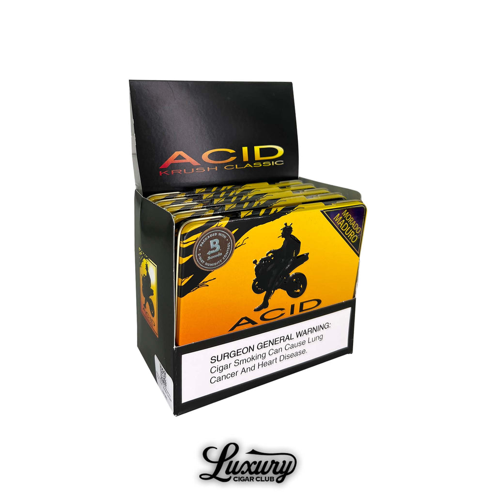 ACID Krush Morado Maduro cigars display box. Open retail display box of ACID Krush Classic Morado Maduro cigars featuring bold yellow and black packaging with a silhouette rider design.