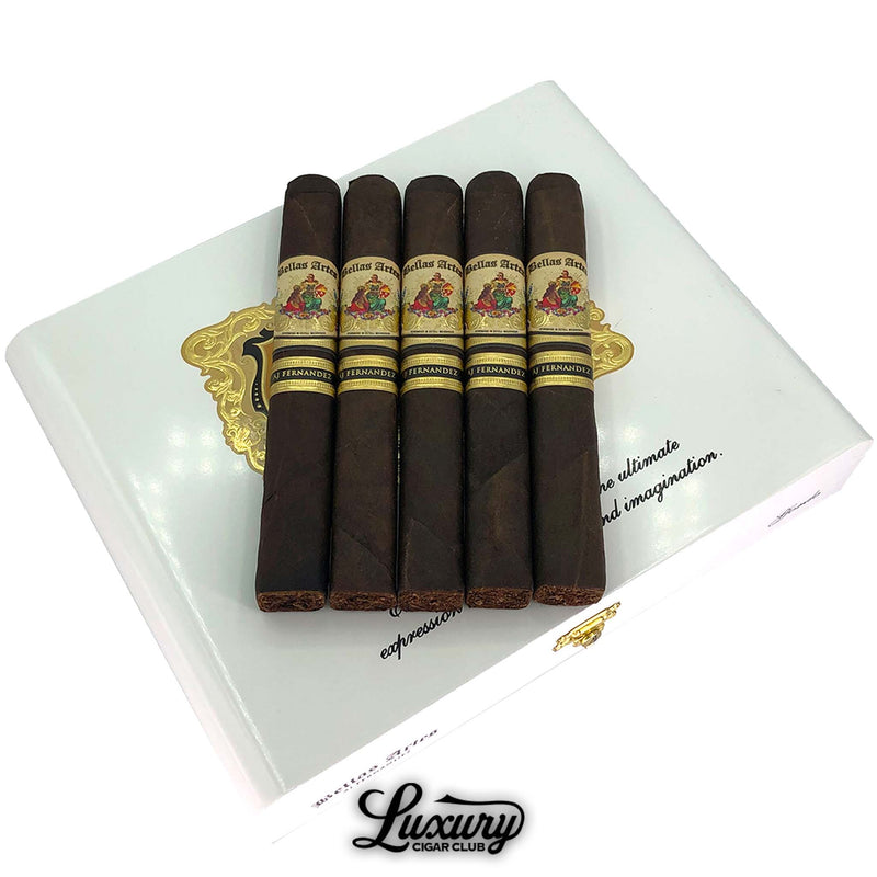 Close-up of AJ Fernandez Bellas Artes Maduro Gordo cigars highlighting the intricate artwork on the bands and the smooth, oily maduro wrapper, featured by Luxury Cigar Club.