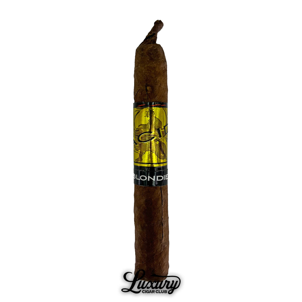 Single Acid Gold Blondie cigar with dark brown wrapper, twisted pigtail cap, and gold holographic band, Luxury Cigar Club logo
