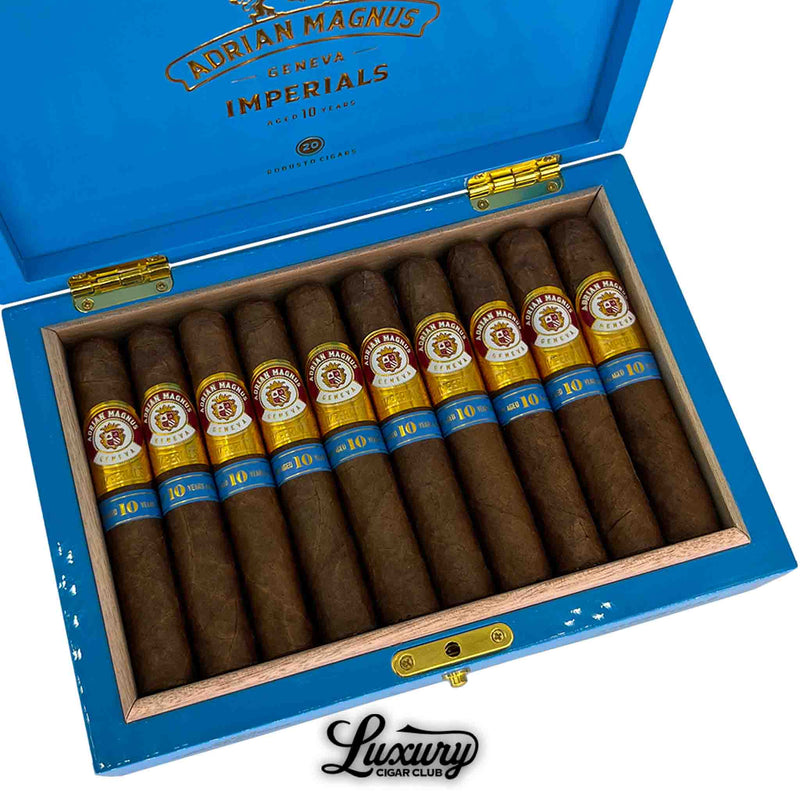 Detailed view of Adrian Magnus Imperials Robusto cigars aged 10 years, showing the golden and blue cigar bands inside the blue luxury box.