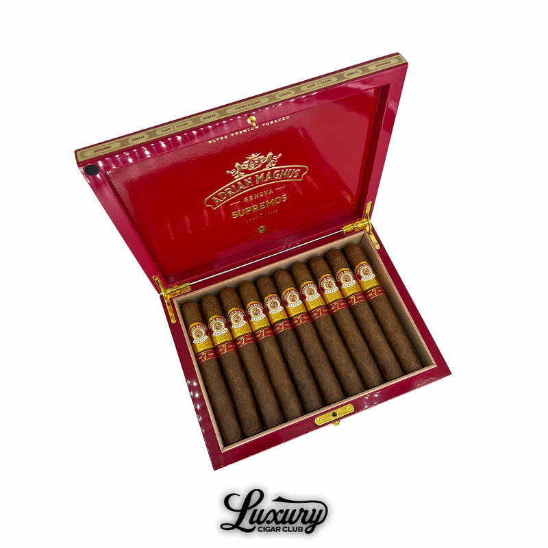 Adrian Magnus Supremos Toro cigars in a luxurious red lacquered box, showcasing premium 7-year aged hand-rolled cigars – available at Luxury Cigar Club.