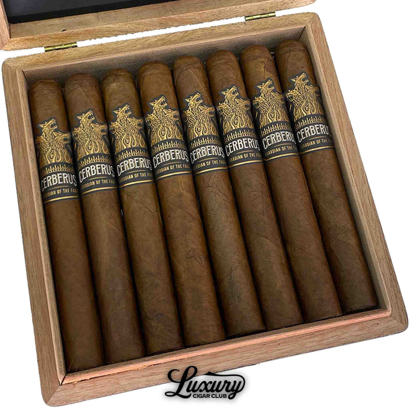 Close-up of Aganorsa Leaf Guardian Of The Farm Cerberus Lonsdale cigars in a wooden box with black and gold labels by Luxury Cigar Club.