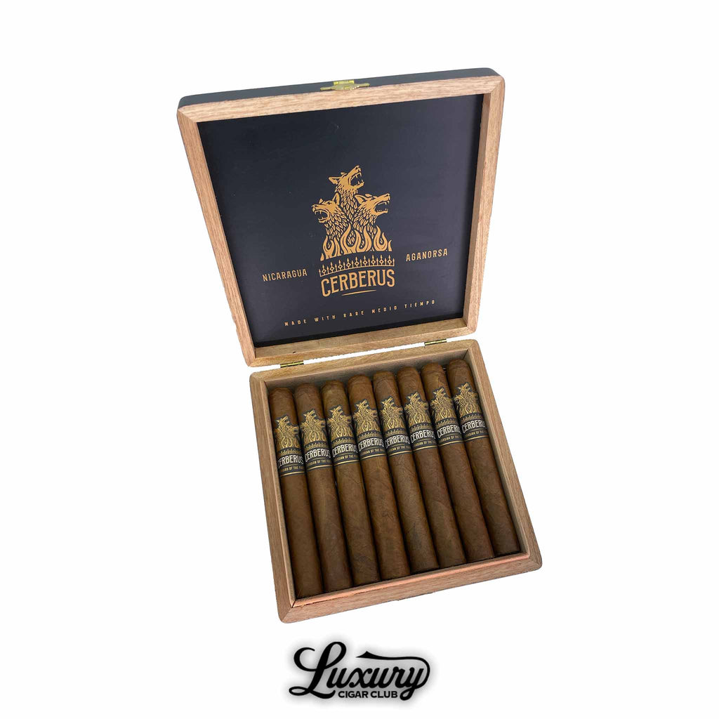 Box of Aganorsa Leaf Guardian Of The Farm Cerberus Lonsdale cigars with black and gold bands, open display by Luxury Cigar Club.