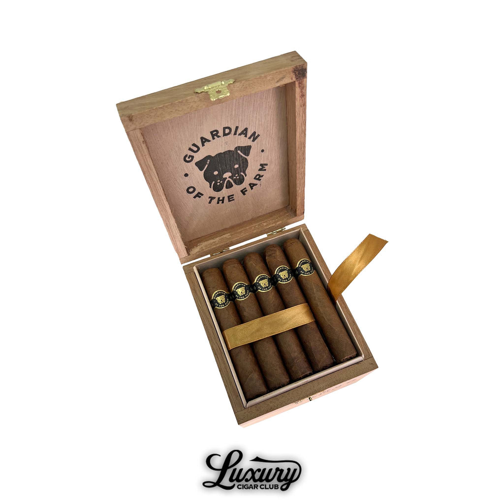 Aganorsa Leaf Guardian of the Farm Seleccion de Warped Rambo cigars in open wooden box with logo and gold ribbon, from Luxury Cigar Club.