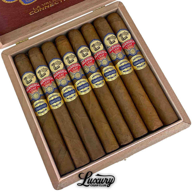 Close-up view of Aganorsa Leaf La Validación Connecticut Toro cigars neatly arranged in an open cedar box for sale at Luxury Cigar Club.