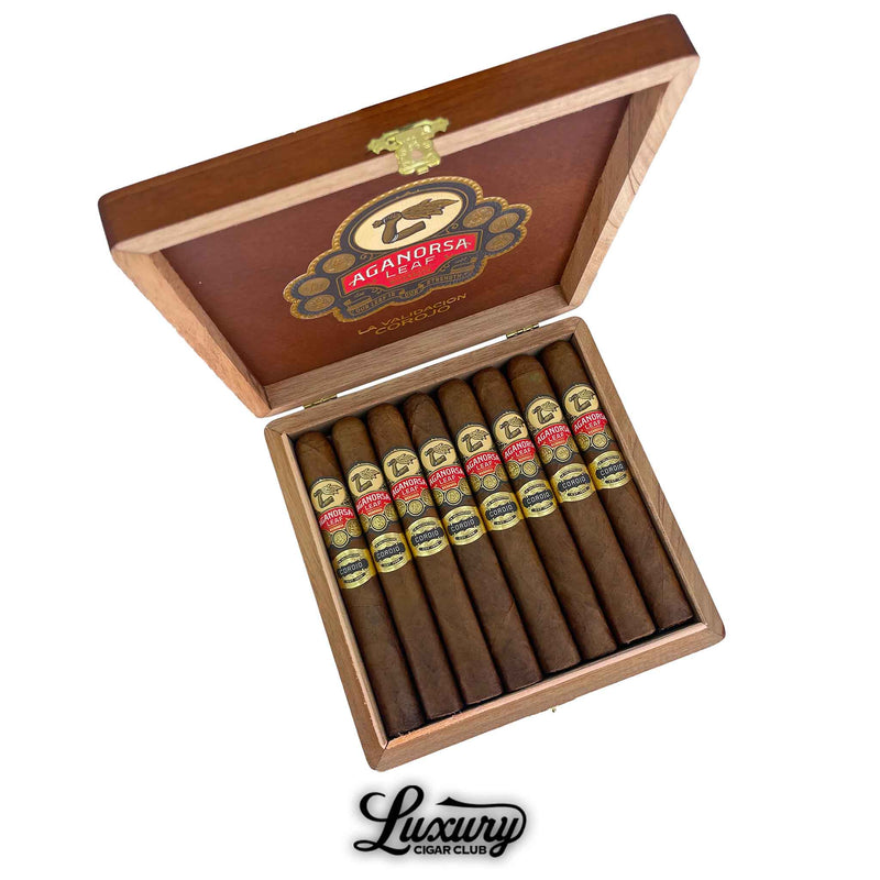Open box of Aganorsa Leaf La Validacion Corojo Toro cigars displayed by Luxury Cigar Club, featuring premium Nicaraguan cigars with gold and red bands, perfect for online cigar enthusiasts and collectors.