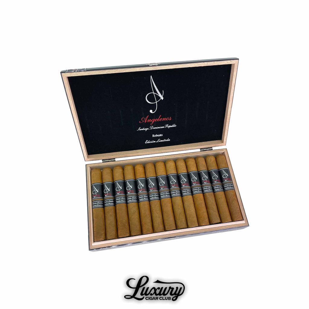 Open box of Angelenos Limited Edition Robusto cigars featuring 13 Dominican-made cigars with black bands, presented in a natural wood box with black velvet-lined lid and red, white, and silver branding, from Luxury Cigar Club.