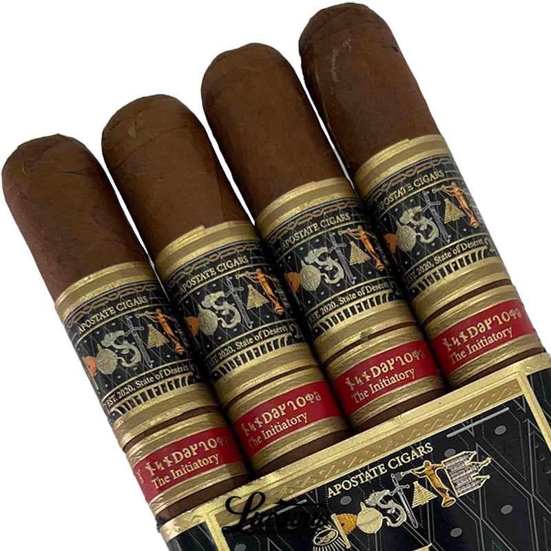 Close-up of Apostate Cigars The Initiatory Toro showing detailed black, gold, and red bands with Masonic imagery and "The Initiatory" branding, highlighting premium wrapper texture.