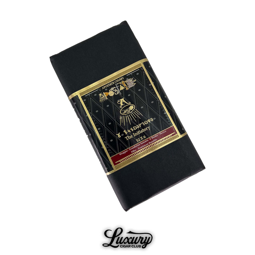 Apostate Cigars The Initiatory Toro 5x54 bundle wrapped in sleek black paper with gold and red label featuring Masonic symbols and cigar blend details, from Luxury Cigar Club.