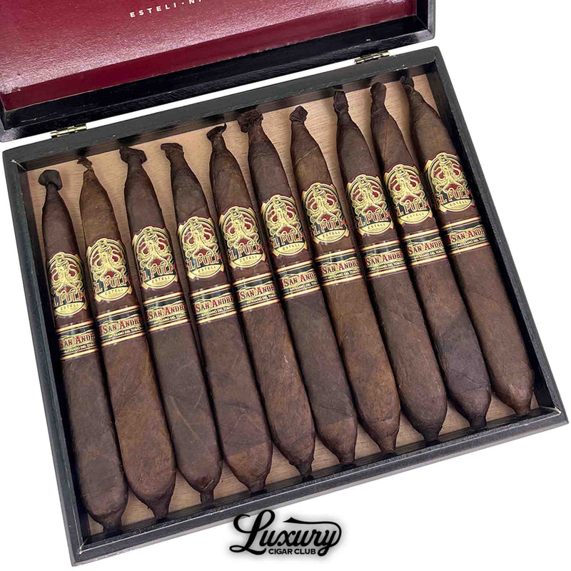 Detailed close up of El Pulpo The Squid Perfecto cigars by Artesano Del Tobacco featuring bold red and gold bands.
