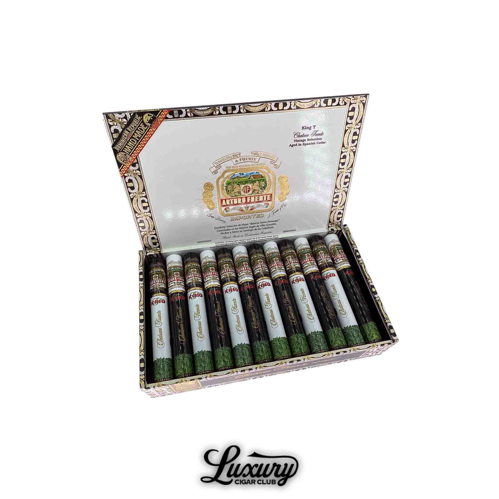 Open box of Arturo Fuente Chateau Fuente King T Tubo cigars, featuring elegant white and black tubos with green leaf detail, available at Luxury Cigar Club.