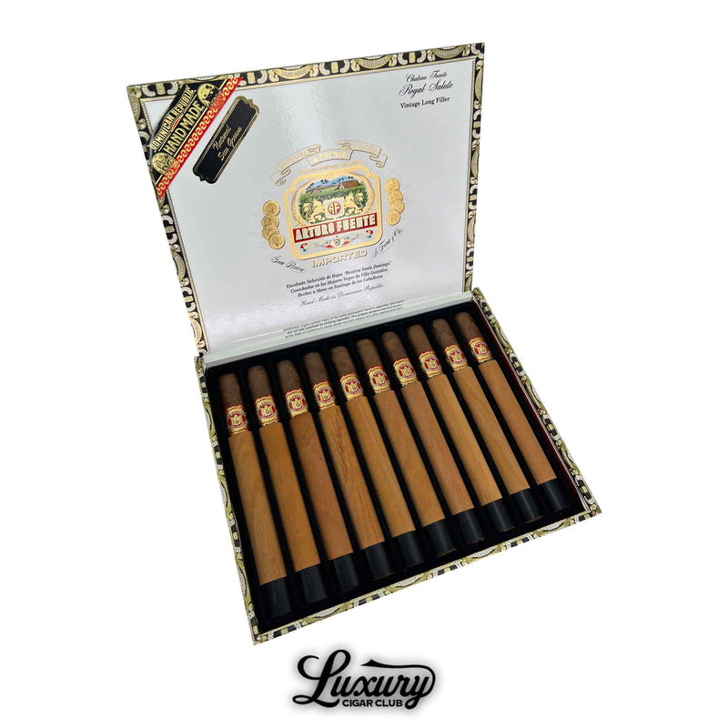 Box of Arturo Fuente Chateau Fuente Royal Salute Sun Grown cigars with cedar sleeves and black foot bands, presented in a decorative open box with vintage branding.