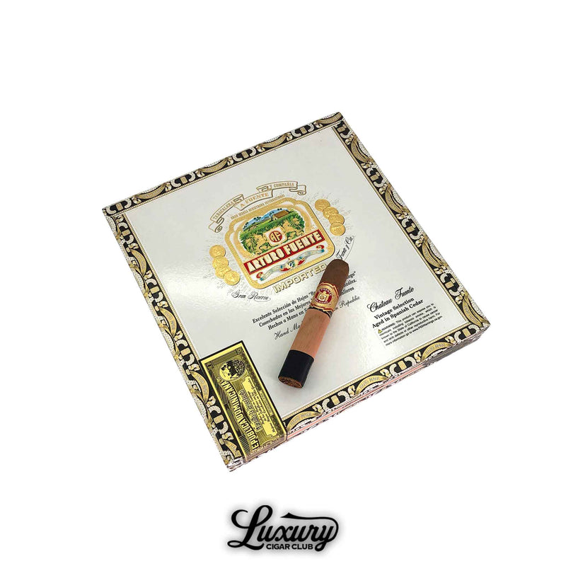 Arturo Fuente Chateau Fuente Sun Grown cigar placed on top of its decorative cigar box, available at Luxury Cigar Club.