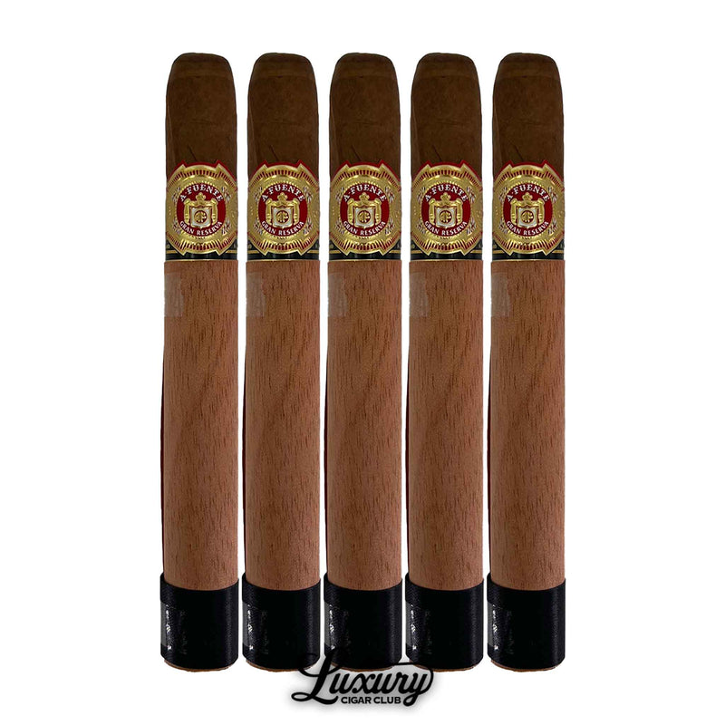 Five-pack of Arturo Fuente Double Chateau Fuente Maduro cigars with cedar sleeves and black foot bands, displayed with the Luxury Cigar Club logo.