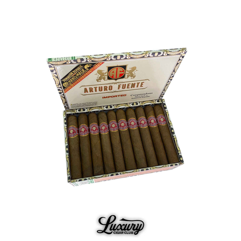 Open box of Arturo Fuente Especiales Conquistadores Natural cigars displayed in rows, each cigar wrapped in a red and white band, set against a detailed interior lid design.