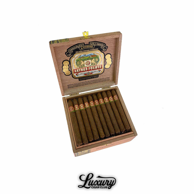 Arturo Fuente Exquisitos Sun Grown cigars in an open cedar box, featuring 10 slim premium cigars with classic red and green bands, displayed with Arturo Fuente branding and Luxury Cigar Club logo.