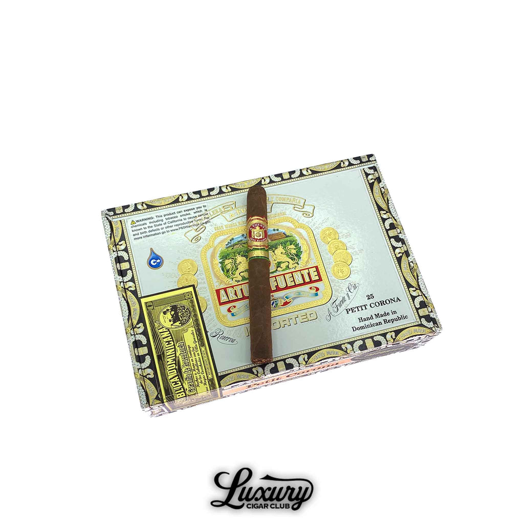 Arturo Fuente Gran Reserva Petit Corona Natural cigars displayed on factory-sealed box - available at Luxury Cigar Club