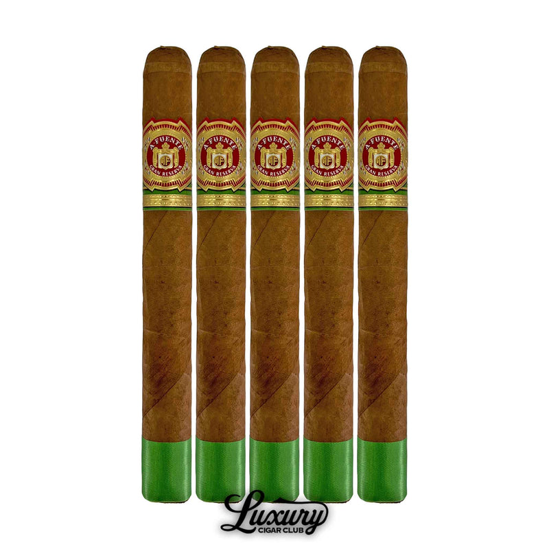 Five-pack of Arturo Fuente Gran Reserva Selección D'Or Corona Imperial Natural cigars with green foot bands, shown with the Luxury Cigar Club logo.