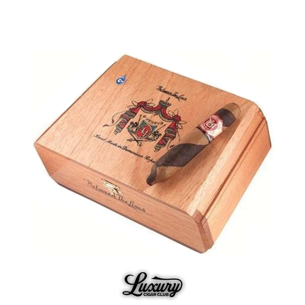 Box of Arturo Fuente Hemingway Between the Lines cigars with one barber pole cigar displayed on top, available at Luxury Cigar Club.