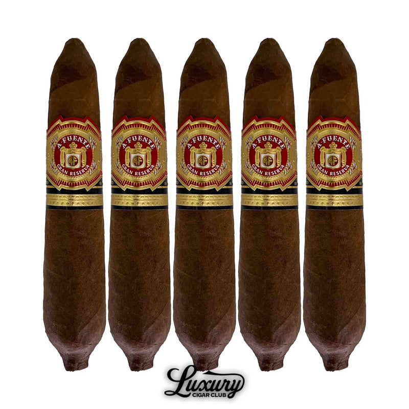 Five Arturo Fuente Hemingway Natural Work of Art cigars displayed in a 5-pack, with perfecto shapes and elegant red and gold cigar bands.