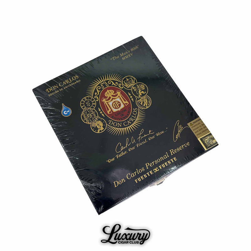 Arturo Fuente Don Carlos Personal Reserve box, wrapped in black with gold foil details, highlighting Edición de Aniversario branding.