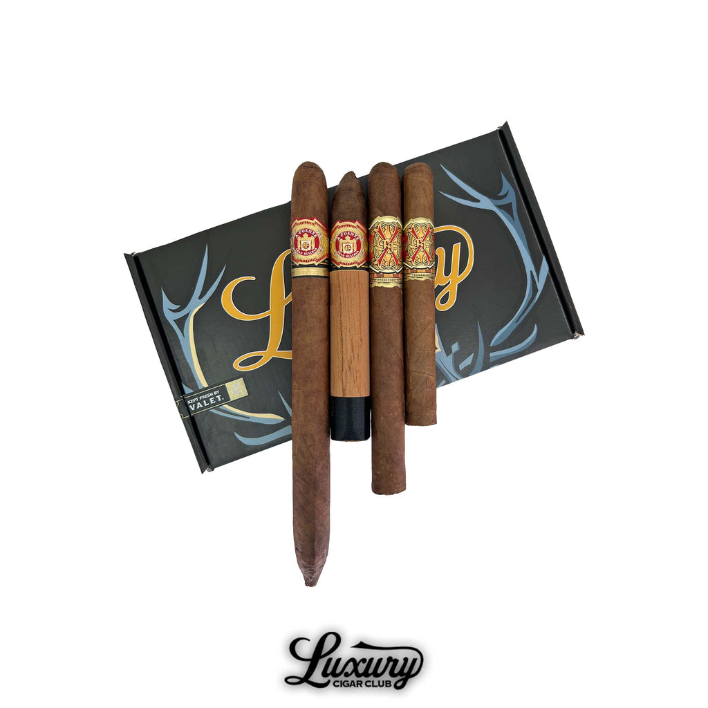 Luxury Cigar Club Arturo Fuente Opus X 7th Anniversary Sampler featuring four rare cigars displayed on branded packaging.
