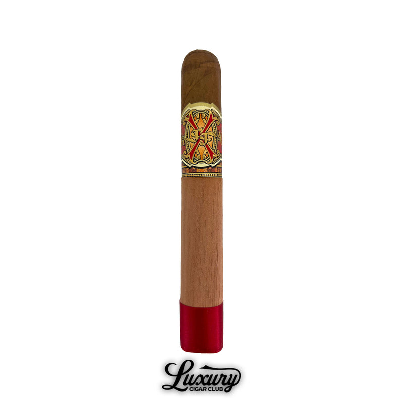 Single Arturo Fuente Opus X Limited Edition Double Robusto cigar with cedar sleeve, red foot band, and iconic Opus X band, isolated on a white background with Luxury Cigar Club branding.