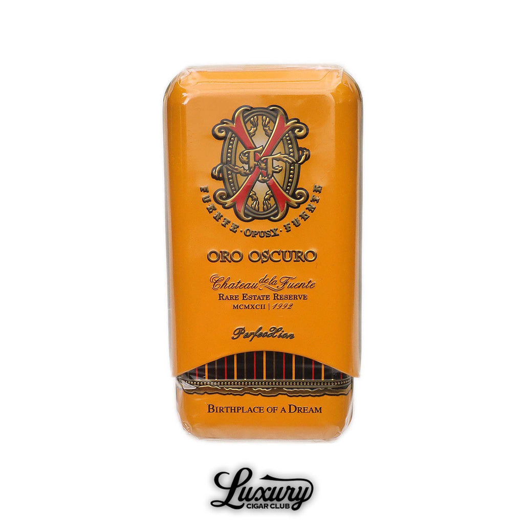 Arturo Fuente Oro Oscuro Chateau de la Fuente Rare Estate Reserve Unicorn Perfecxion tin of 3 premium cigars in golden packaging, available at Luxury Cigar Club.