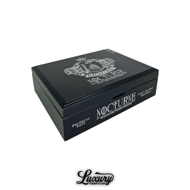 Luxury Cigar Club product image of the closed Black Label Trading Co. Deliverance Nocturne Limited Edition combo box in a glossy black finish featuring bold silver Nocturne artwork and vitola markings on the sides.