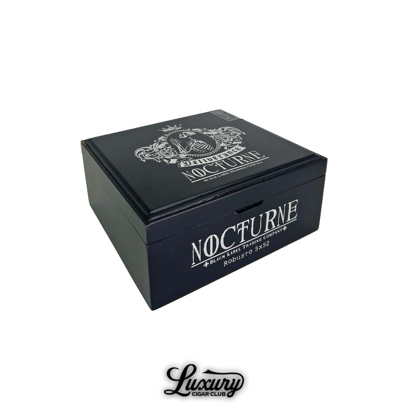 Closed Black Label Trading Co. Deliverance Nocturne Robusto cigar box from Luxury Cigar Club with black matte finish and silver Nocturne branding.