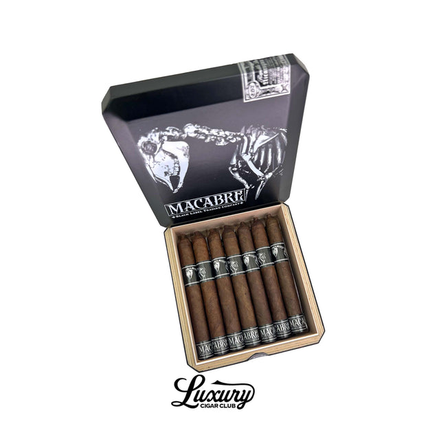 Black Label Trading Co Macabre PCA Exclusive Corona Gorda cigars displayed in an open collector box featuring gothic skeletal artwork and premium dark cigars, Luxury Cigar Club