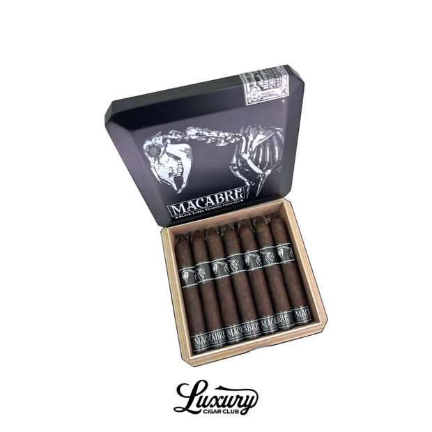 Black Label Trading Co Macabre PCA Exclusive Robusto cigars displayed in an open collector box featuring dark premium cigars with gothic skeletal branding, Luxury Cigar Club
