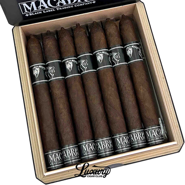 Close-up of Black Label Trading Co Macabre PCA Exclusive Toro cigars showcasing dark wrappers, skeletal band artwork, and premium handcrafted construction, Luxury Cigar Club