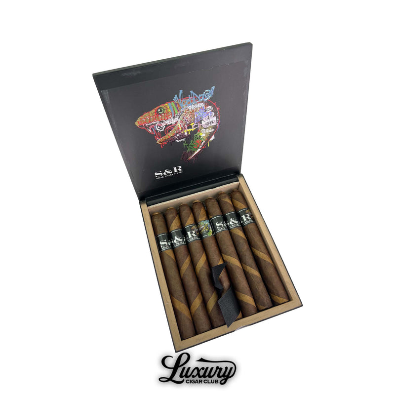 Black Works Studio S&R Limited Edition Corona Larga cigars displayed in an open box with striking snake artwork, presented by Luxury Cigar Club.
