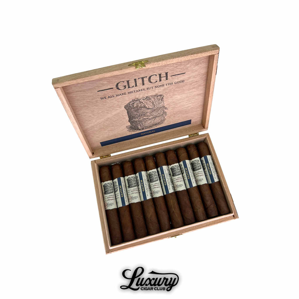 Open wooden box of Blackbird Glitch Natural Robusto cigars with blue and cream bands, displayed diagonally to show the detailed interior lid design, available at Luxury Cigar Club.