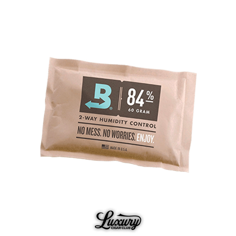 Boveda 84% 60-gram humidor seasoning pack for two-way humidity control, designed to prepare cigar humidors for optimal storage. Available at Luxury Cigar Club.