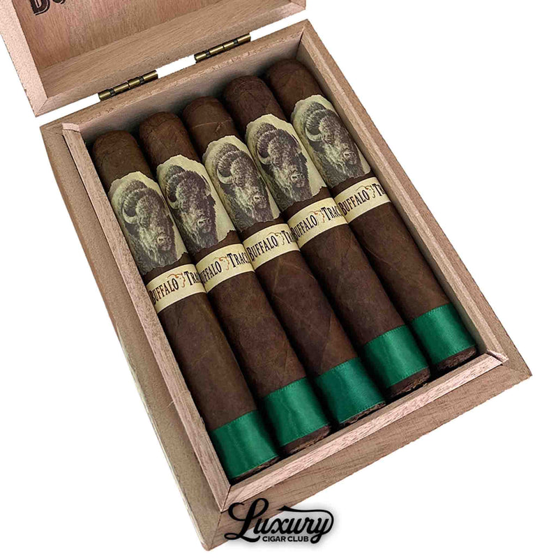 Close-up of Buffalo Trace Robusto Cigars in an open wooden box, featuring rustic buffalo-themed bands and green foot ribbons, available at Luxury Cigar Club