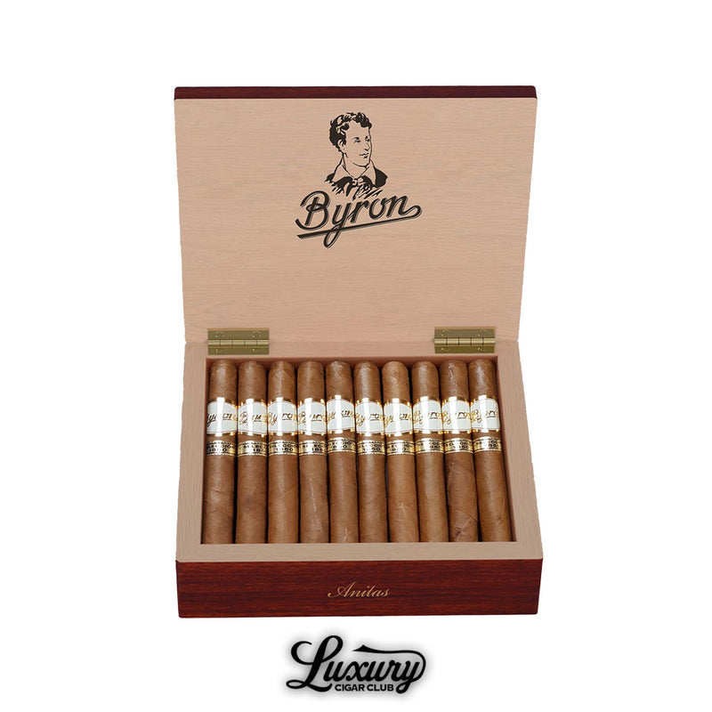 Open cedar box of Byron Selección 1850 Anitas cigars with elegant white and gold bands, presented at Luxury Cigar Club, showcasing refined construction and premium aged tobaccos.