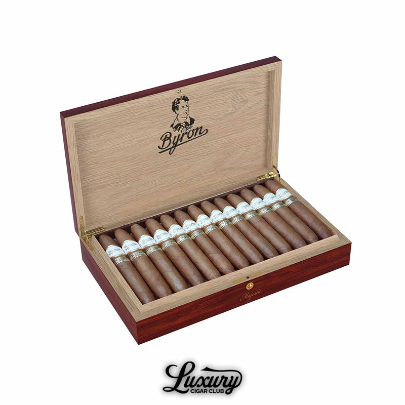Byron Selección 1850 Majestic cigars in an open cedar box, full-bodied luxury cigars with white and gold Byron bands, featured by Luxury Cigar Club.
