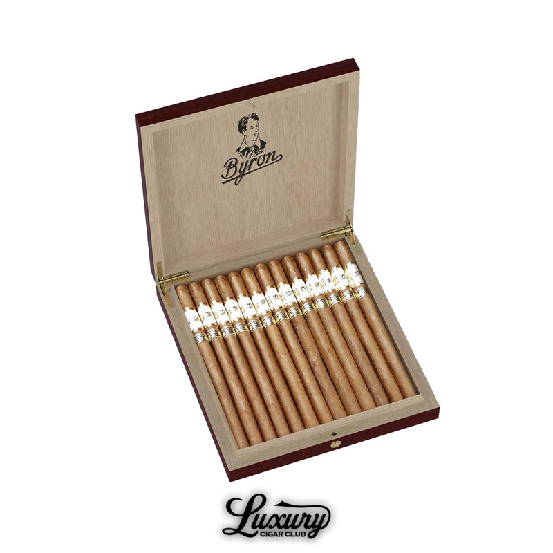 Open box of Byron Selección 1850 Selección Privada Rositas cigars from Luxury Cigar Club with light brown small format cigars banded in white and gold arranged in a cedar box under the Byron logo