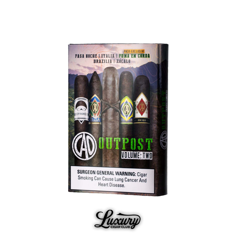 CAO Outpost Volume Two Fuma Em Corda sampler pack standing upright with five premium dark wrapper cigars inside the retail box packaging, photographed on a white background for Luxury Cigar Club.