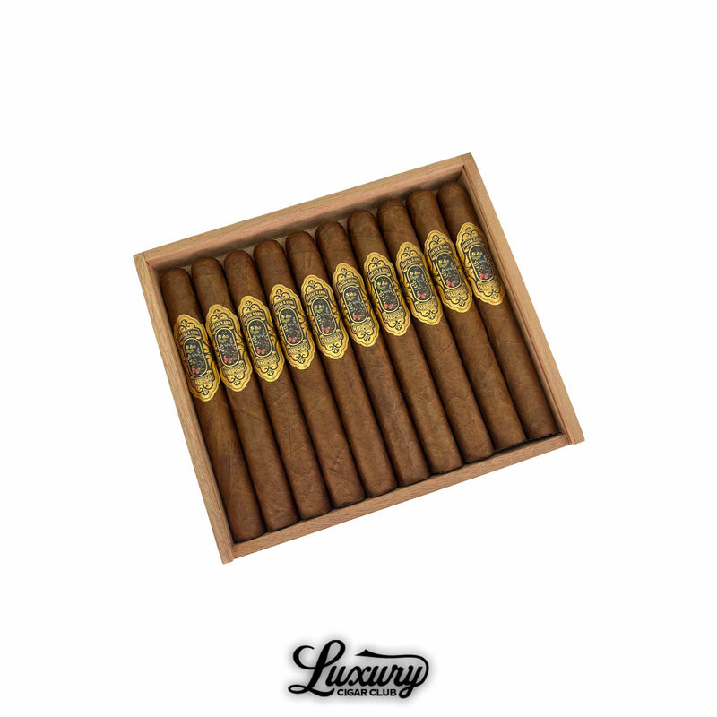 Cartas de Amor Mariposas Corona Gorda cigars arranged in an open cedar box, featuring ornate gold and black bands, from Luxury Cigar Club.