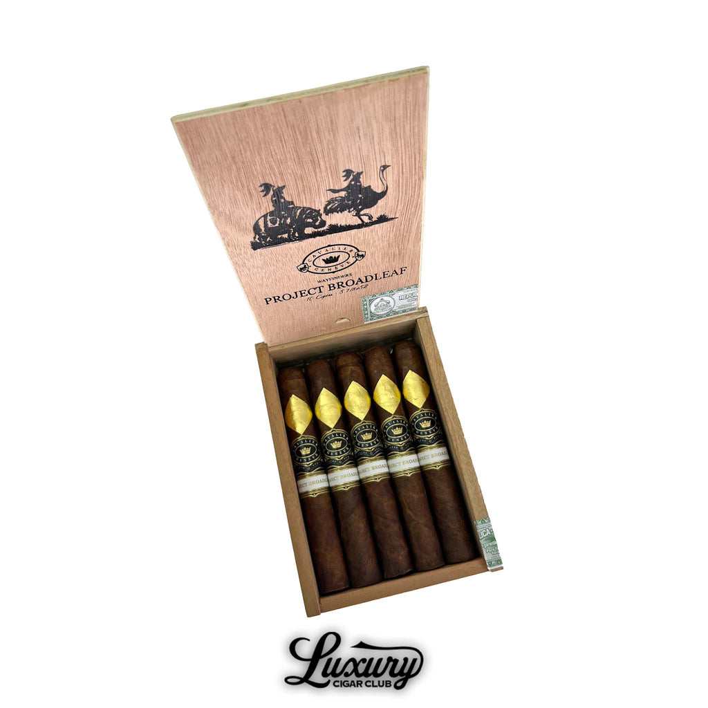 Cavalier Genève Project Broadleaf Wayfinders Robusto Extra box of cigars showcasing elegant gold diamond accents and rich Broadleaf wrappers, featured by Luxury Cigar Club.