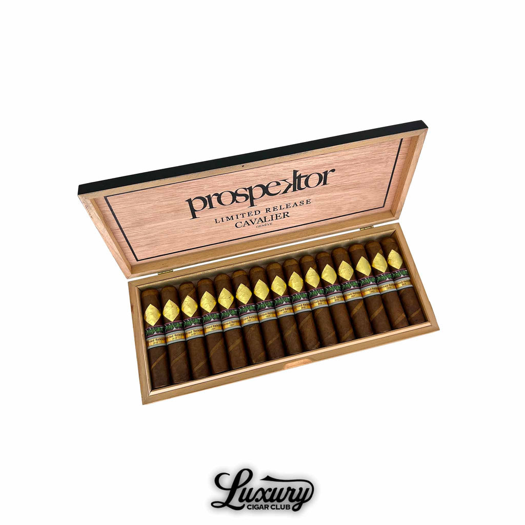 Luxury Cigar Club open box of Cavalier Genève Prospektor Limited Release 2025 cigars displaying fifteen perfectly arranged parejos with gold diamond foil accents and branded interior lid