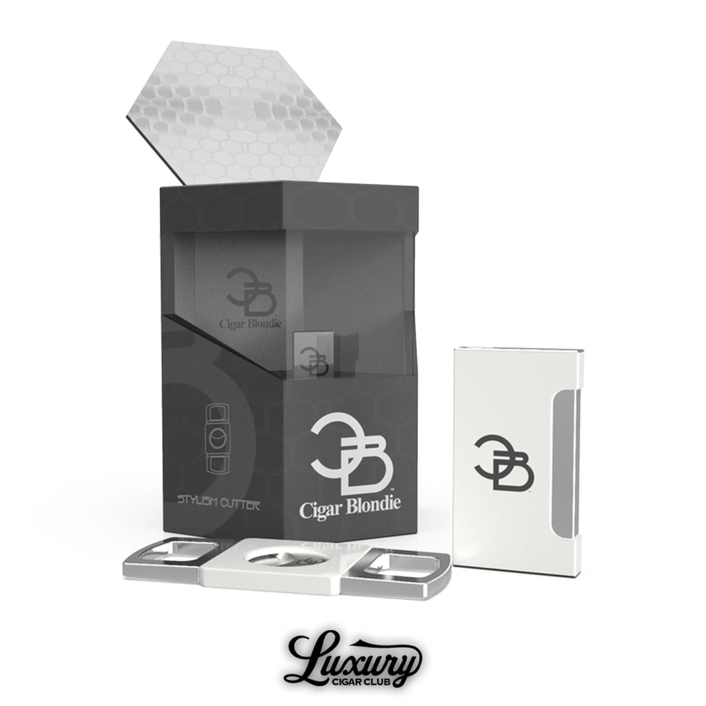 White Cigar Blondie lighter and cutter collection set shown with branded packaging at Luxury Cigar Club
