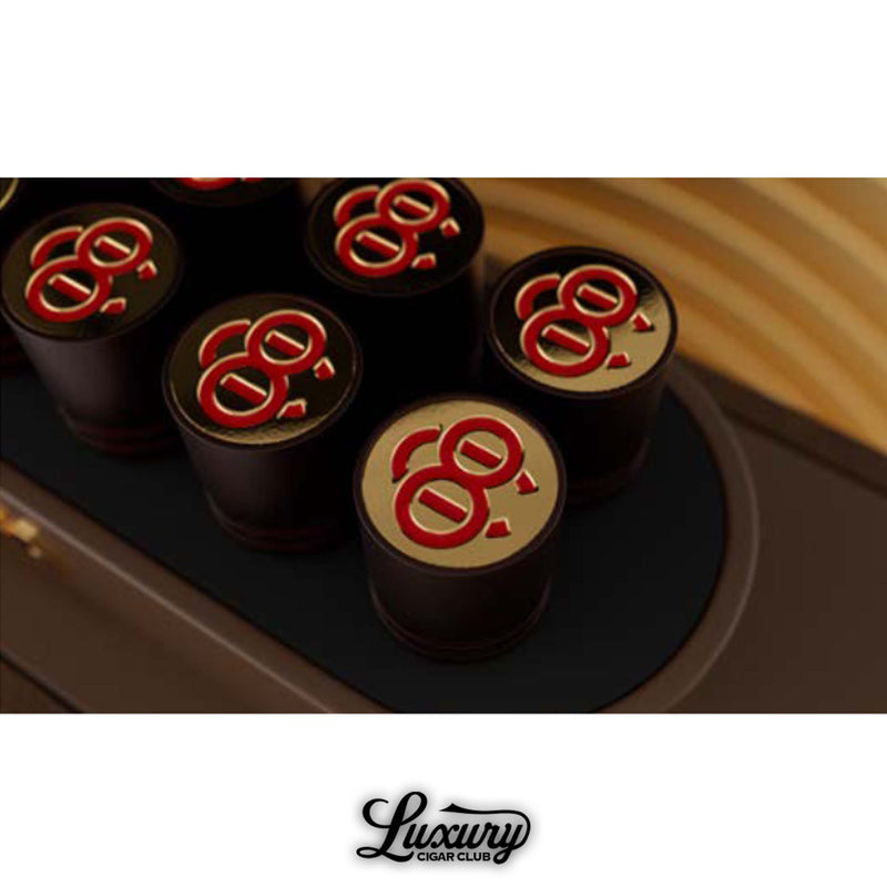 Luxury Cigar Club product photo close up showing the Cohiba C8 Churchill cigar tube caps printed with the red and gold C8 mark for the 80 Years Cohiba anniversary release.
